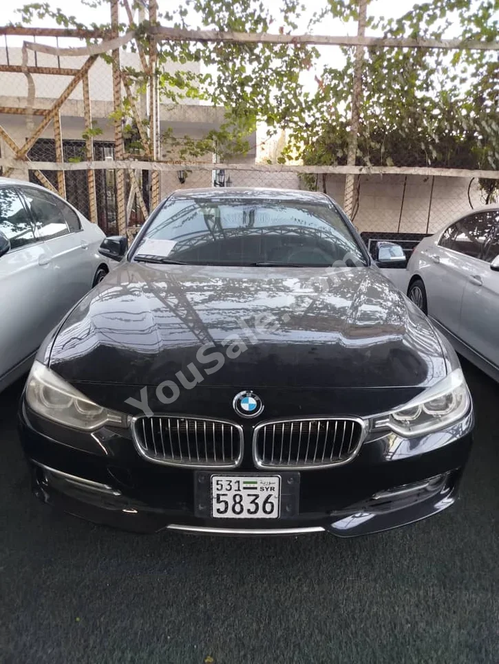 بي ام دبليو الفئة - الثالثة 328i 2012 اتوماتيك 300,000 كم 4 سلندر دفع خلفي سيدان أسود بنزين
