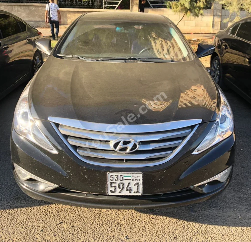 هيونداي سوناتا 2013 اتوماتيك 142,000 كم 4 سلندر دفع أمامي سيدان أسود بنزين