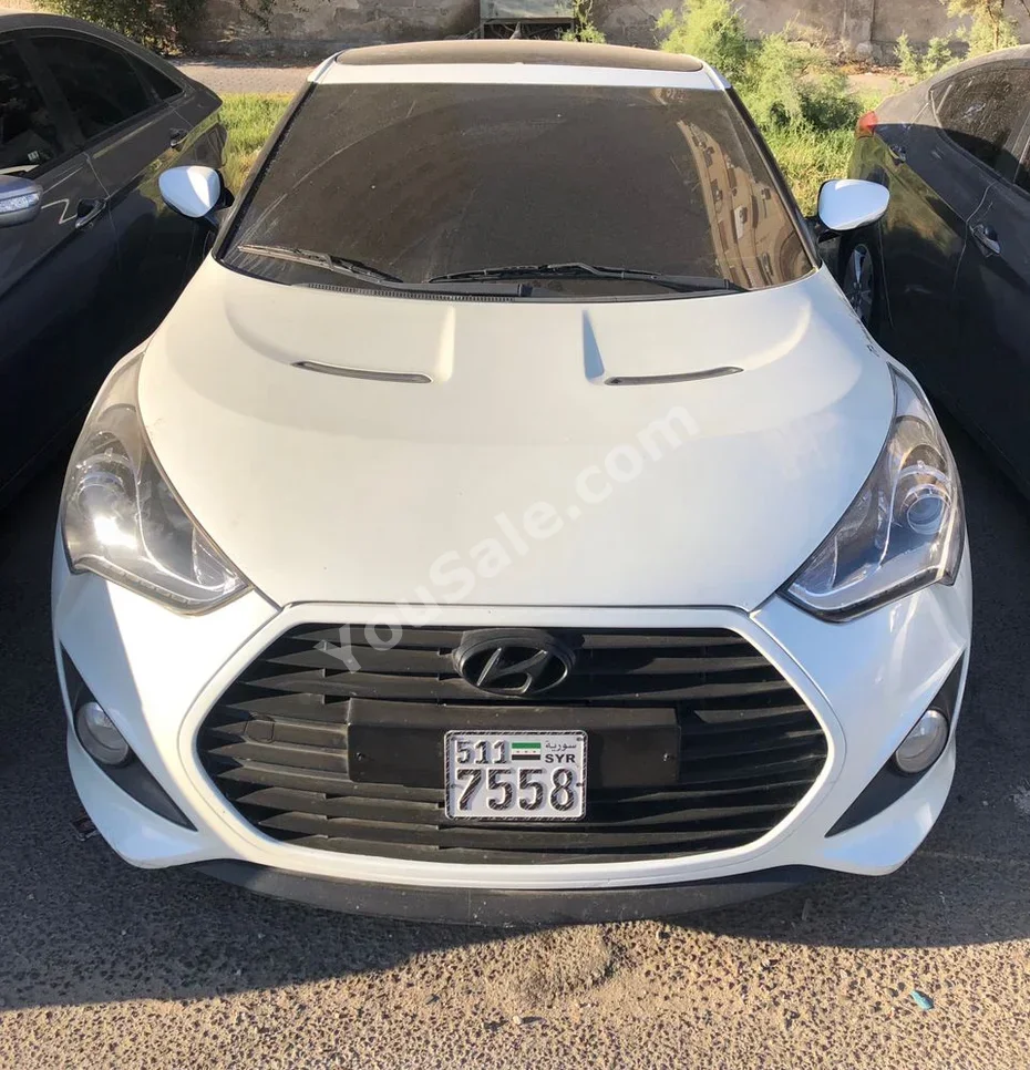 Hyundai  Veloster  2013  Automatic  177,000 km  4 Cylinder  FWD  Coupe / Sport  White  Gasoline