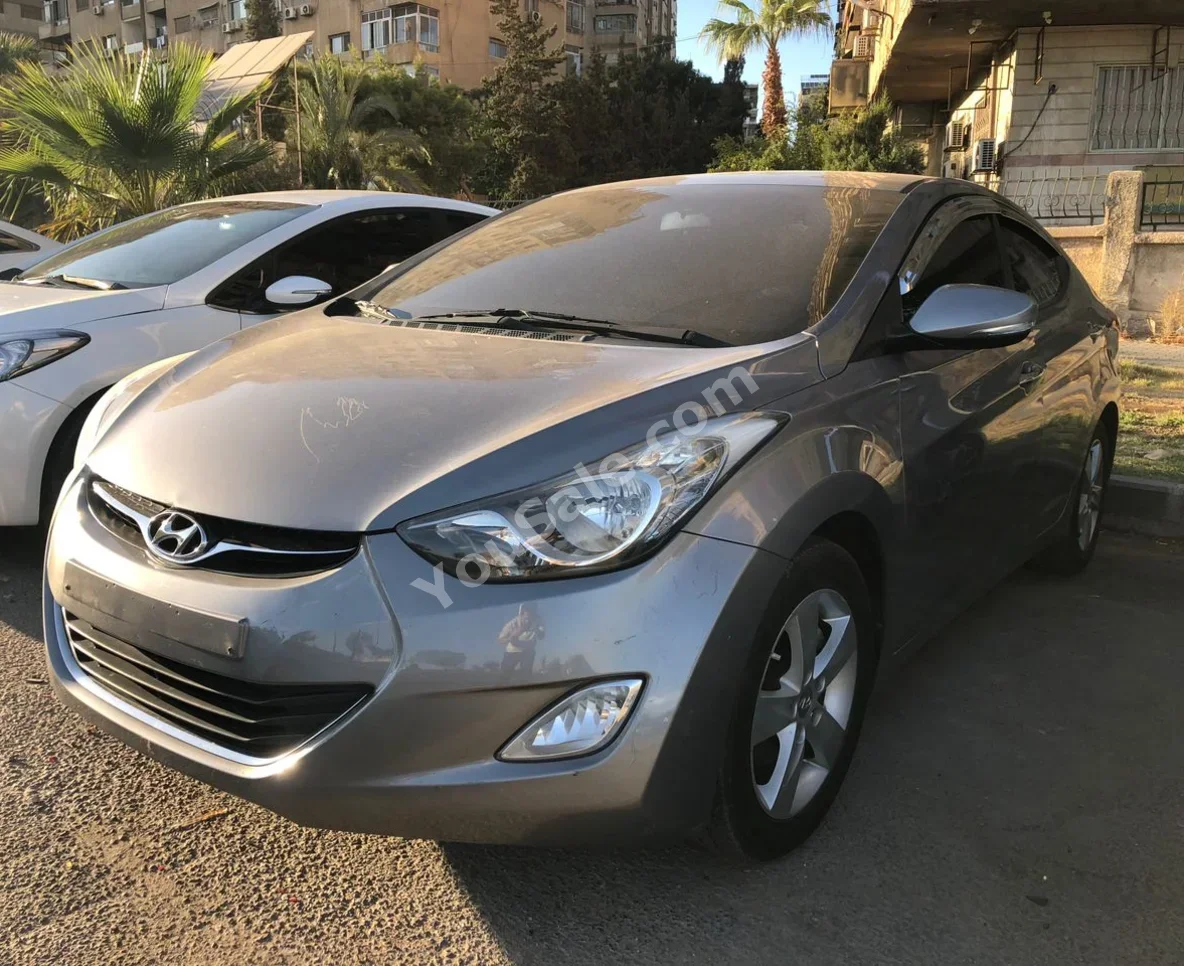 Hyundai  Avante  2012  Automatic  110,000 km  4 Cylinder  FWD  Sedan  Gray  Gasoline