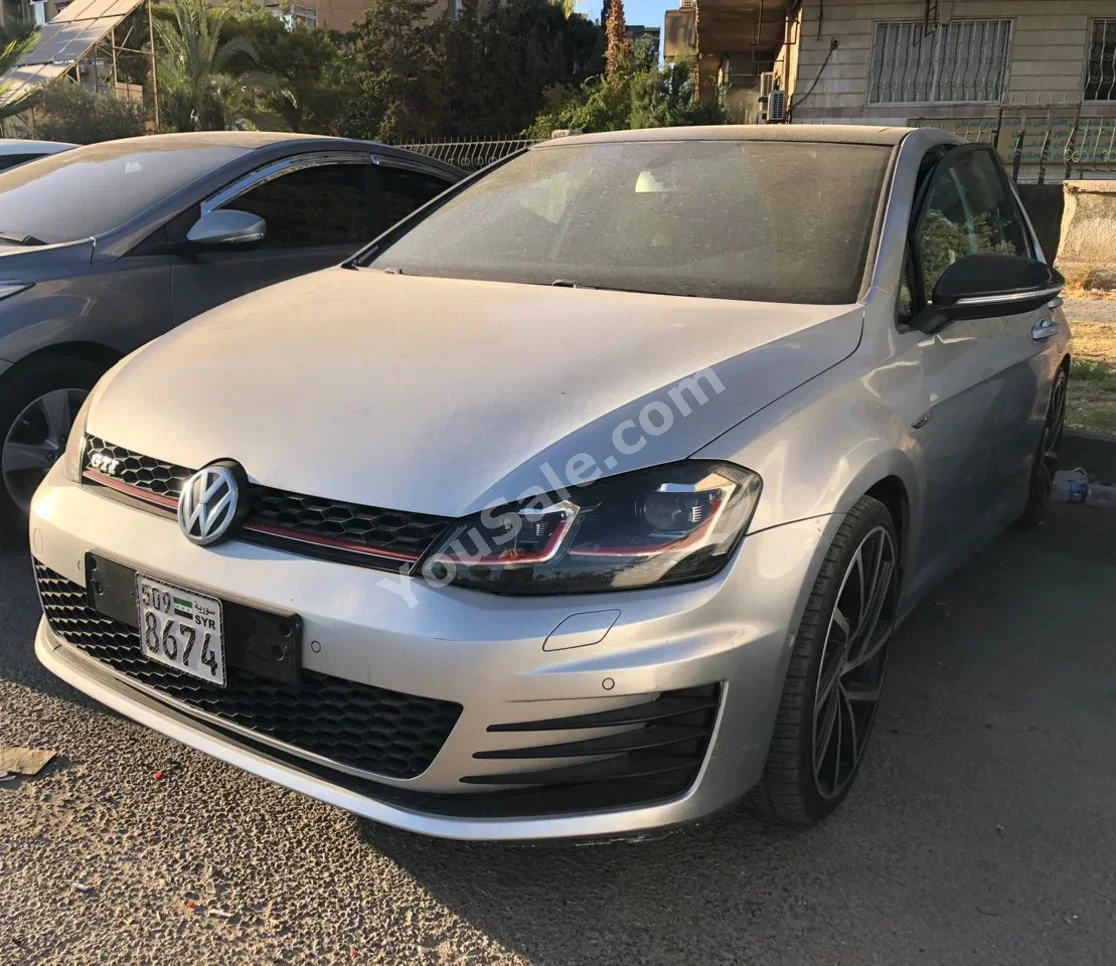 Volkswagen  GTI  2014  Automatic  158,000 km  4 Cylinder  FWD  Hatchback  Silver  Gasoline