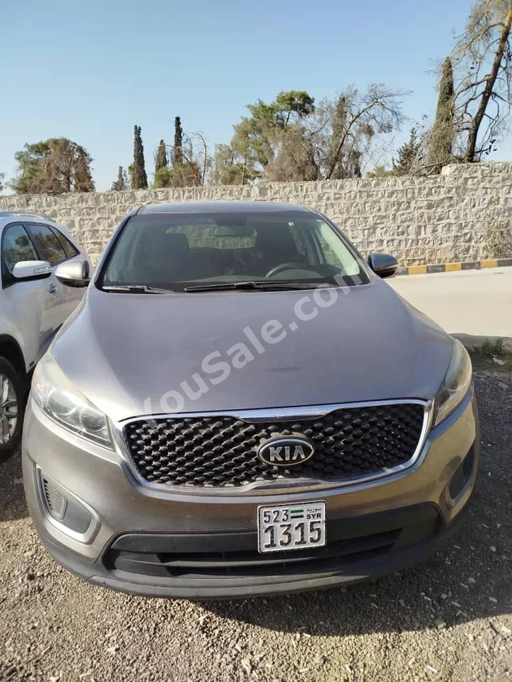 Kia  Sorento  2011  Automatic  220,000 km  4 Cylinder  FWD  SUV  Dark Gray  Gasoline