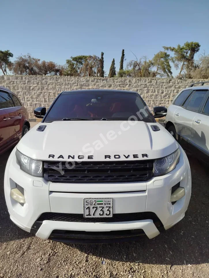 Land Rover Evoque 2012 Automatic 136,196 km 4 Cylinder 4WD Coupe / Sport White Gasoline