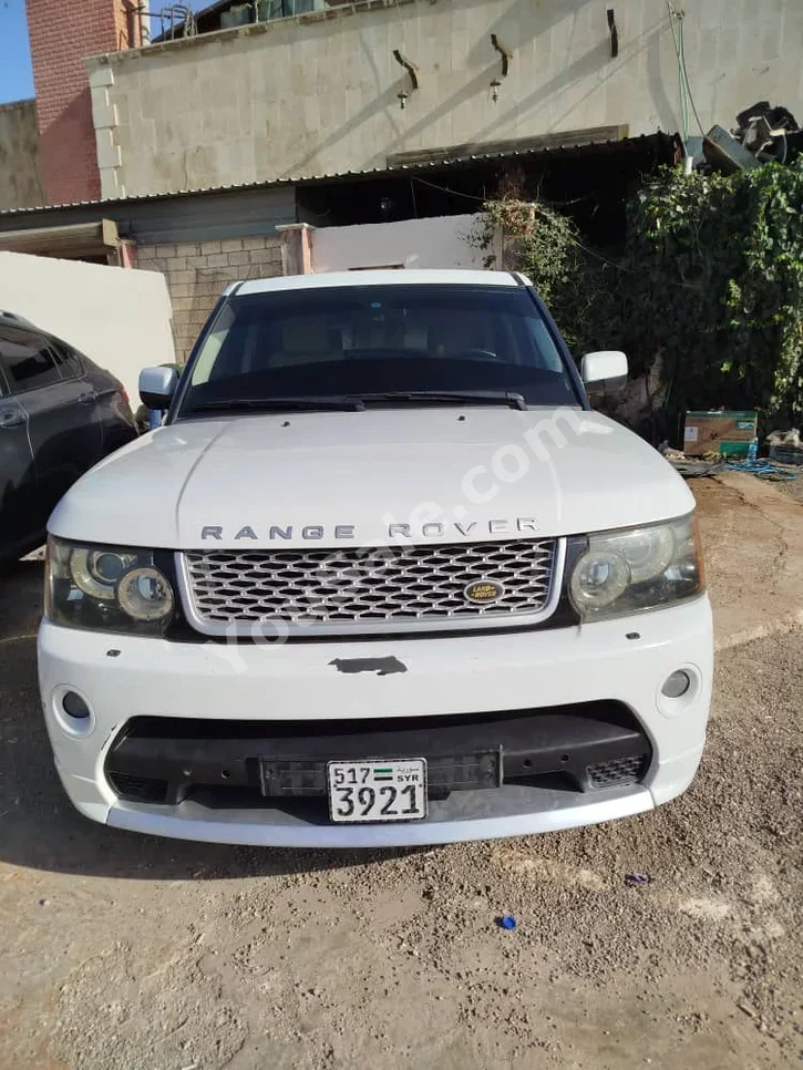 Land Rover  Range Rover  Sport  2012  Automatic  212,130 km  8 Cylinder  4WD  SUV  White  Gasoline
