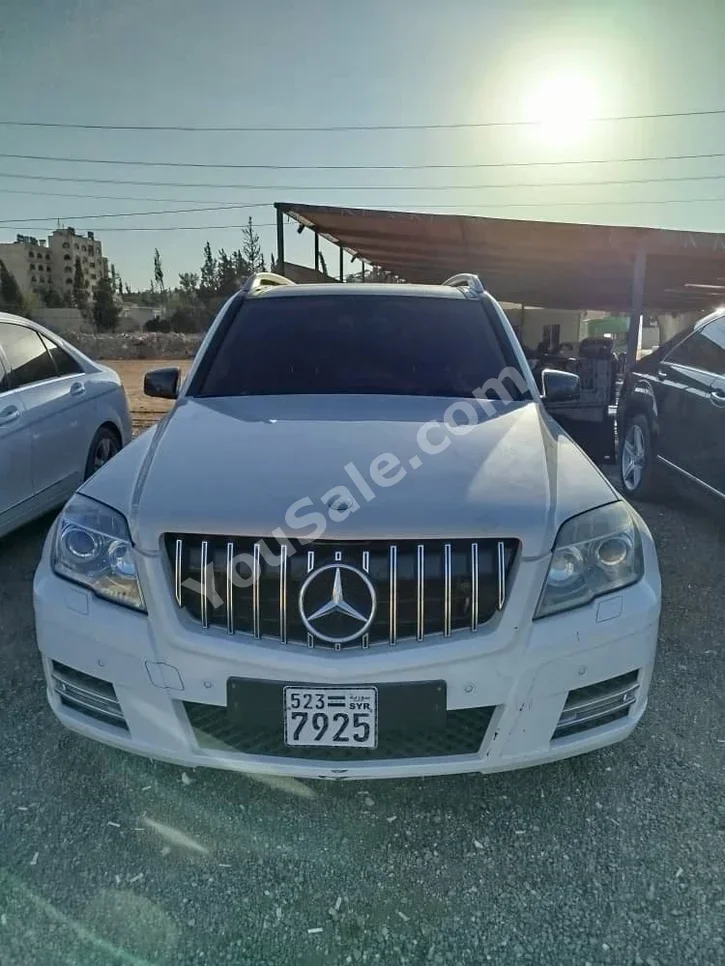 Mercedes-Benz  GLK-Class  220  2012  Automatic  203,000 km  4 Cylinder  4WD  SUV  White  Gasoline