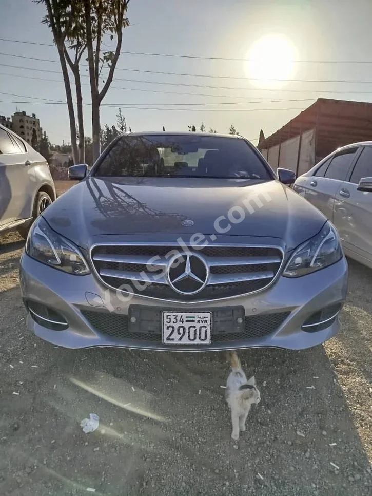 Mercedes-Benz  E-Class  350  2015  Automatic  125,000 km  4 Cylinder  4WD  Sedan  Dark Gray  Gasoline