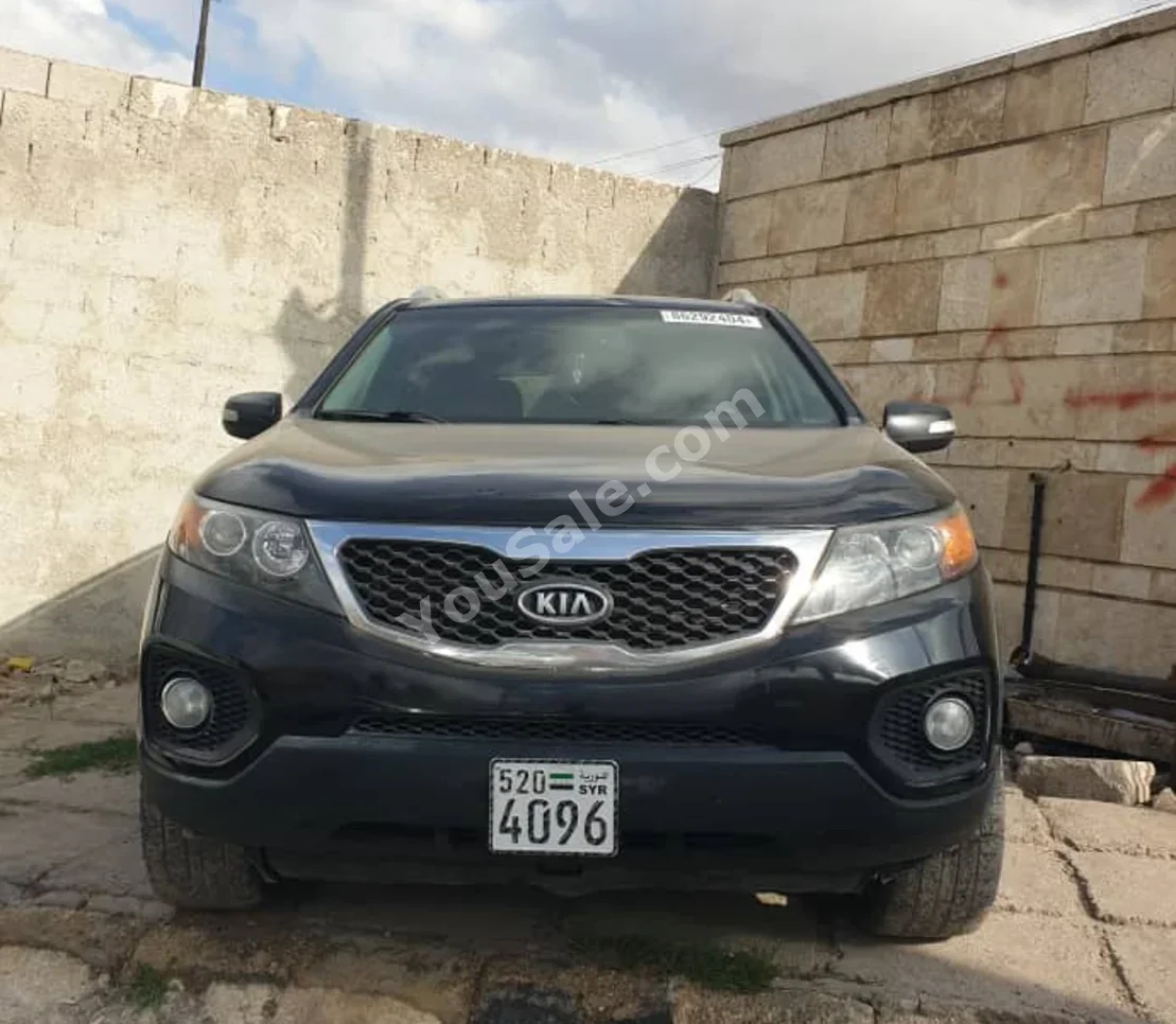 Kia  Sorento  2011  Automatic  125,000 km  4 Cylinder  FWD  SUV  Black  Diesel