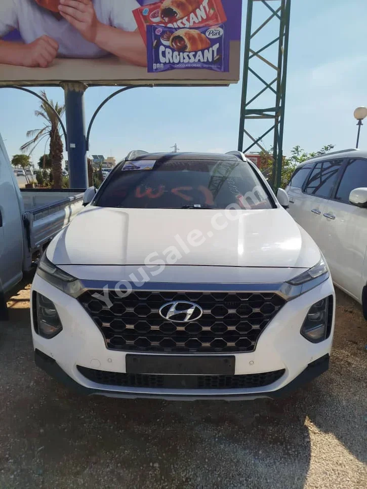 Hyundai  Santa Fe  2019  Automatic  170,000 km  4 Cylinder  FWD  SUV  White  Diesel