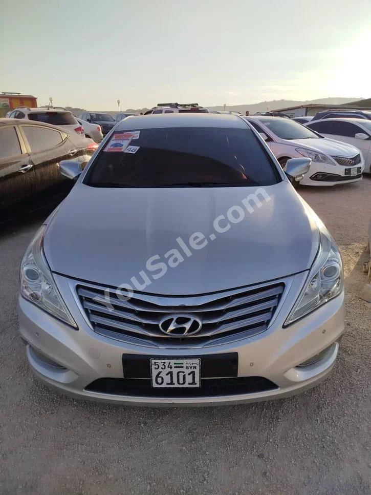 Hyundai  Grandeur  2012  Automatic  300,000 km  6 Cylinder  FWD  Sedan  Silver  Gasoline