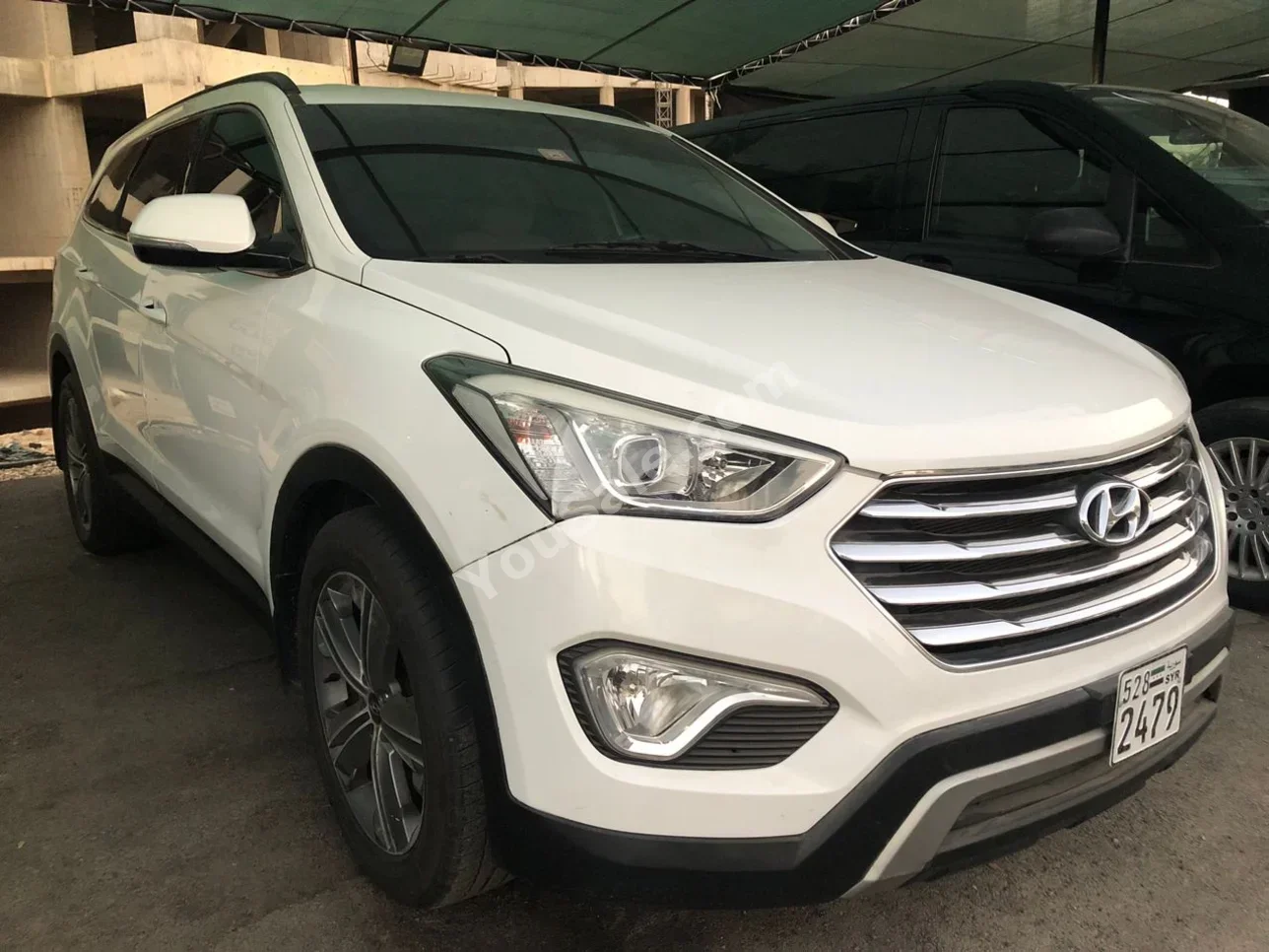 Hyundai  Santa Fe  2015  Automatic  227,000 km  6 Cylinder  AWD  SUV  White  Gasoline