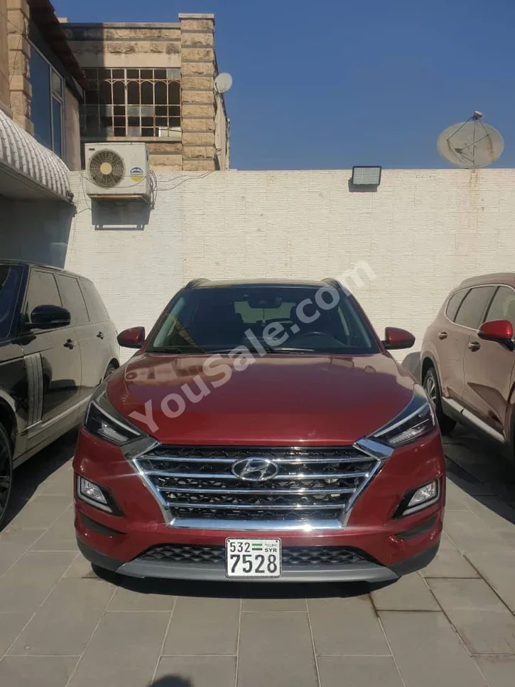 Hyundai  Tucson  2019  Automatic  120,000 km  4 Cylinder  FWD  SUV  Red  Gasoline