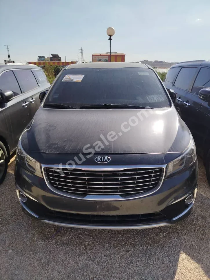 Kia  Carnival  2015  Automatic  230,000 km  4 Cylinder  FWD  Van / Bus  Dark Gray  Diesel