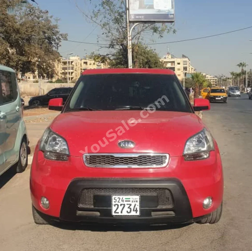 Kia  Soul  2012  Automatic  100,000 km  4 Cylinder  FWD  Hatchback  Red  Gasoline