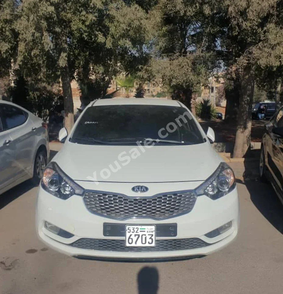 Kia  K3  2013  Automatic  94,000 km  4 Cylinder  FWD  Sedan  White  Gasoline