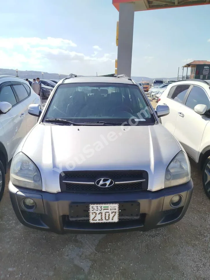 Hyundai  Tucson  2007  Automatic  170,000 km  4 Cylinder  FWD  SUV  Silver  Diesel
