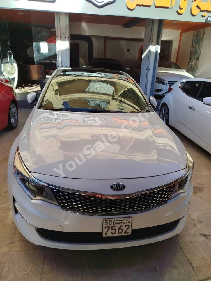 Kia  Optima  2016  Automatic  150,000 km  4 Cylinder  FWD  Sedan  White  Gasoline