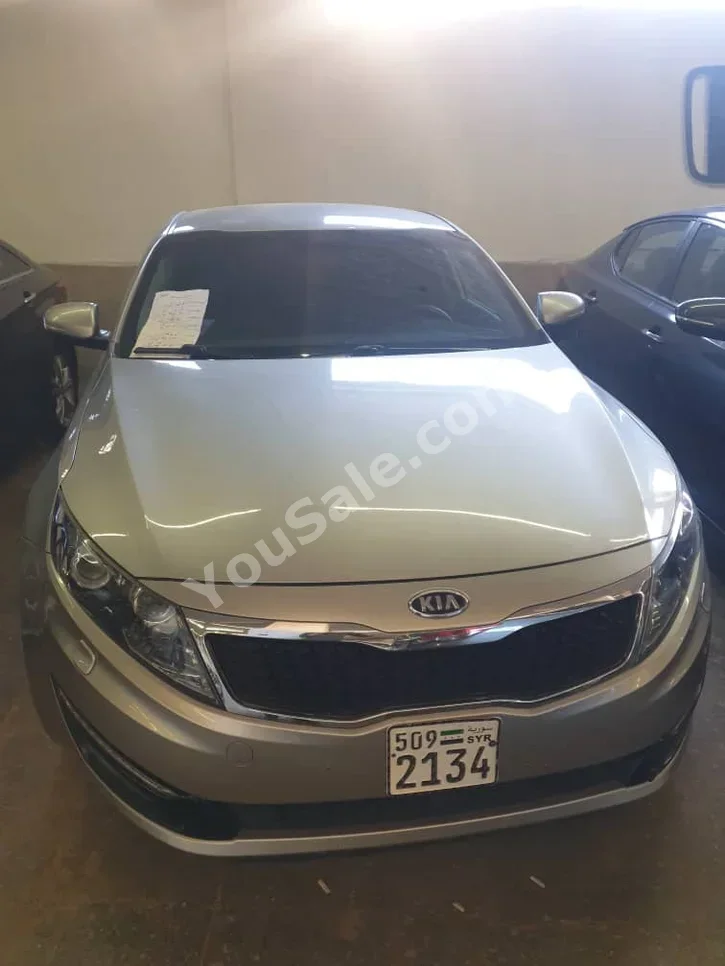 Kia  Optima  2012  Automatic  200,000 km  4 Cylinder  FWD  Sedan  Silver  Diesel