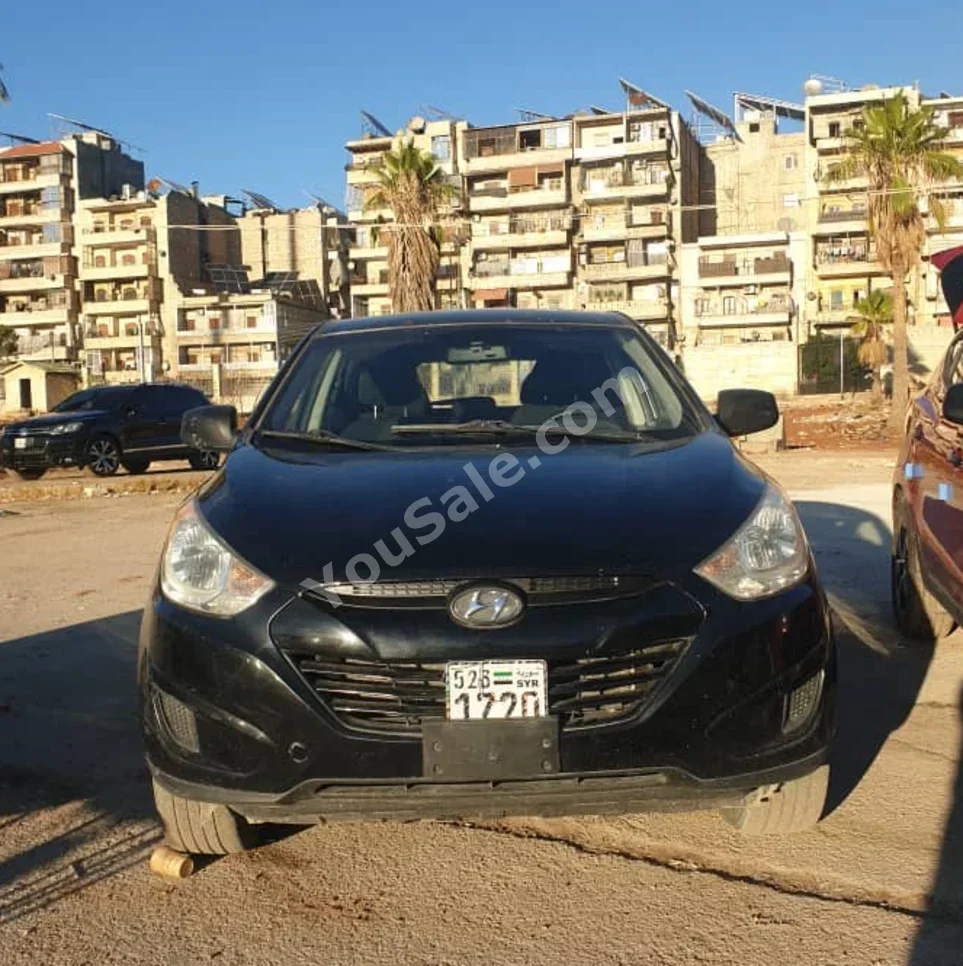 Hyundai  Tucson  2012  Automatic  160,000 km  4 Cylinder  4WD  SUV  Black  Gasoline