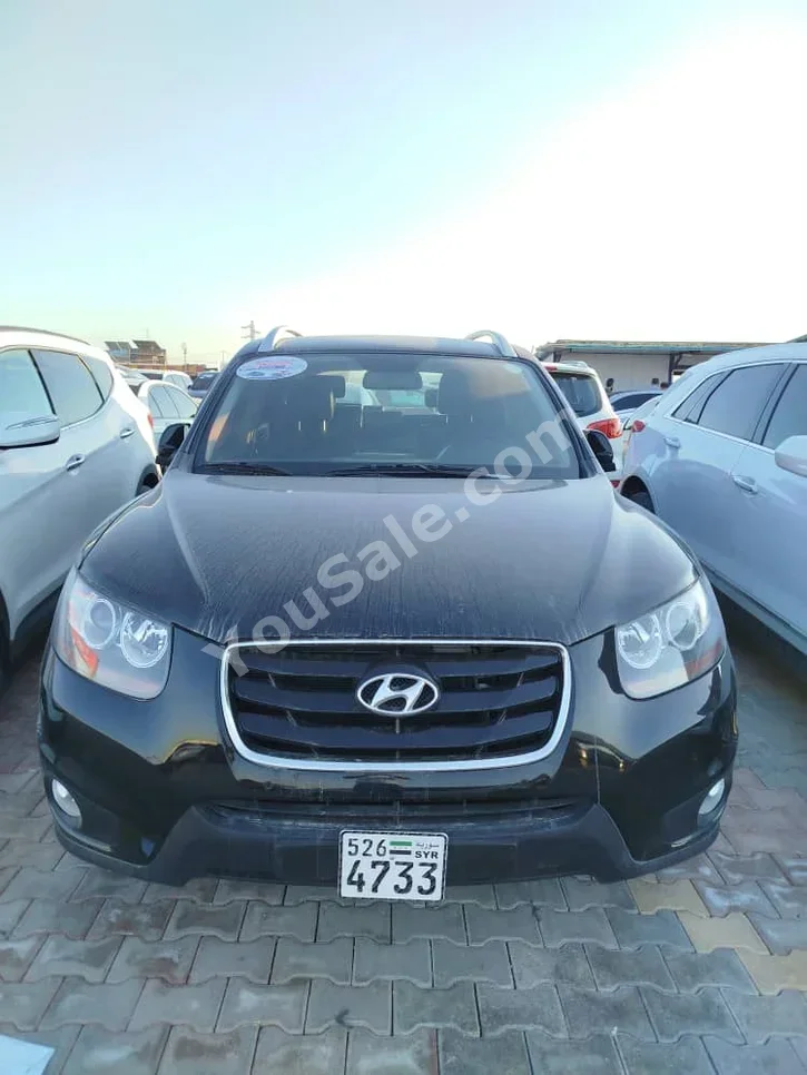 Hyundai  Santa Fe  2010  Automatic  500,000 km  4 Cylinder  FWD  SUV  Black  Diesel