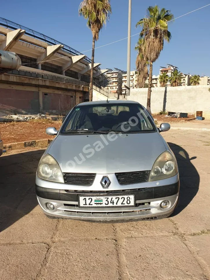 Renault  Clio  2006  Automatic  200,000 km  4 Cylinder  FWD  Sedan  Silver  Gasoline