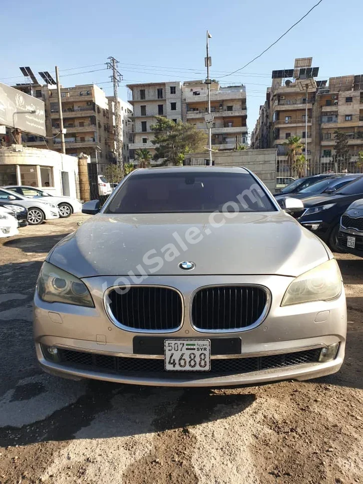 BMW  7-Series  740 Li  2013  Automatic  160,000 km  6 Cylinder  4WD  Sedan  Light Gold  Gasoline