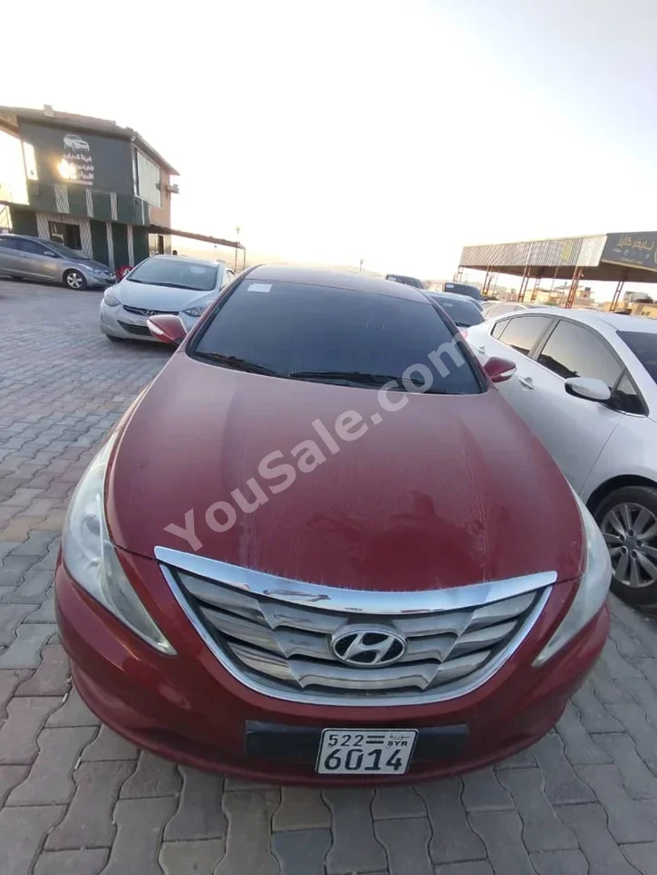 Hyundai  Sonata  2012  Automatic  275,000 km  4 Cylinder  FWD  Sedan  Red  Gasoline