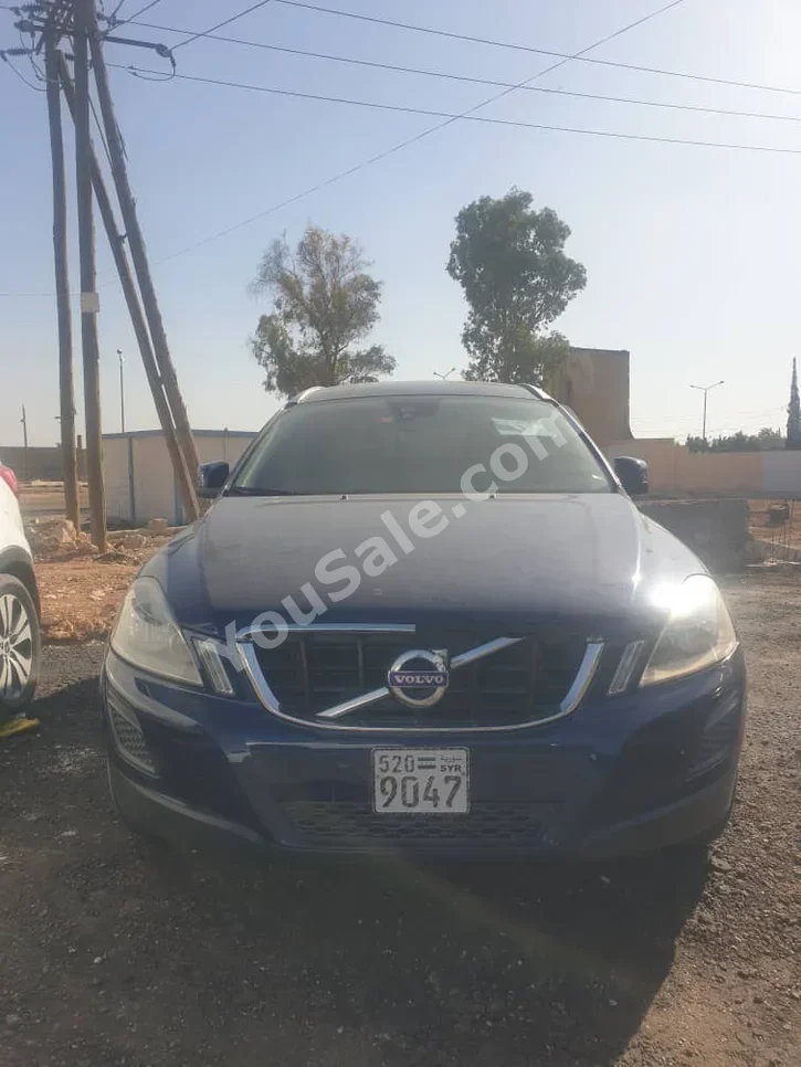 Volvo  XC  60  2012  Automatic  170,000 km  4 Cylinder  FWD  SUV  Dark Blue  Gasoline
