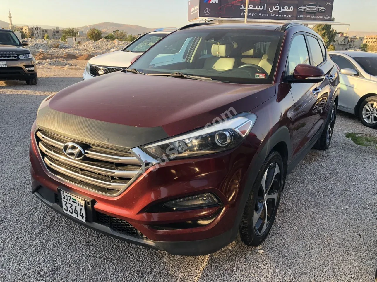 Hyundai  Tucson  2016  Automatic  292,000 km  4 Cylinder  AWD  SUV  Dark Red  Gasoline