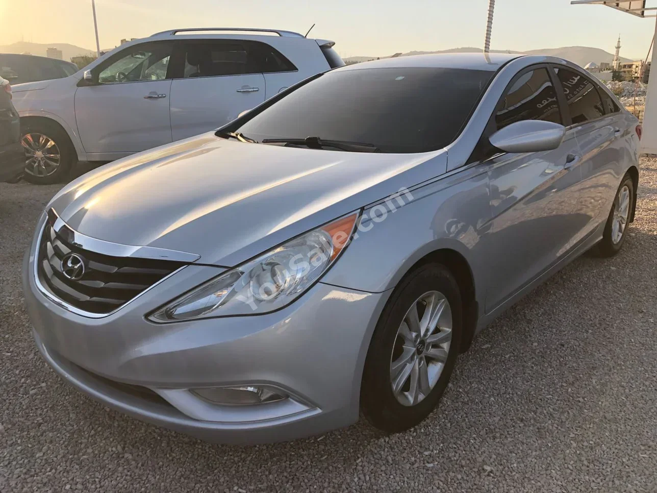 Hyundai  Sonata  2012  Automatic  115,000 km  4 Cylinder  FWD  Sedan  Silver  Gasoline