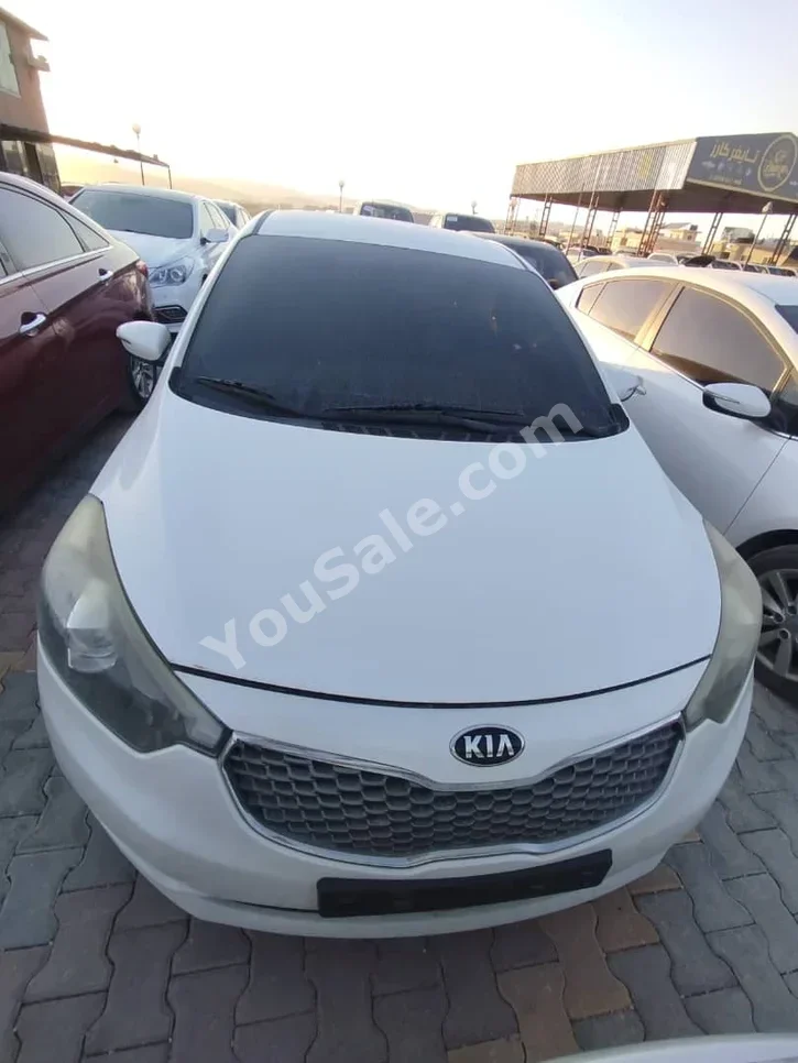 Kia  K3  2013  Automatic  120,000 km  4 Cylinder  FWD  Sedan  White  Gasoline