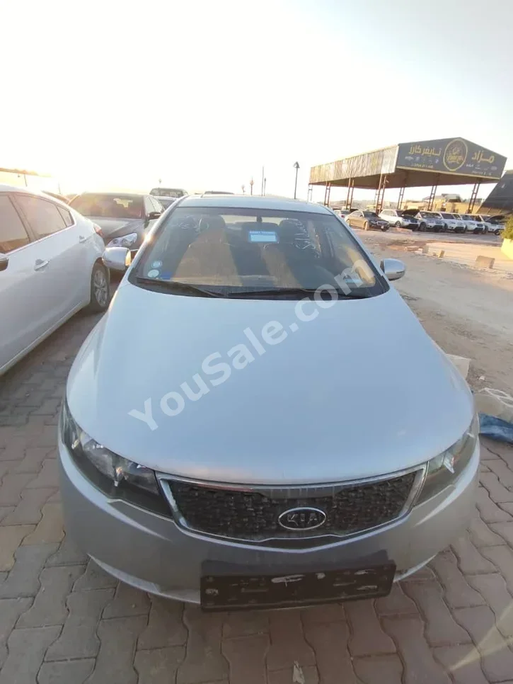 Kia  Forte  2011  Automatic  190,000 km  4 Cylinder  FWD  Sedan  Silver  Gasoline