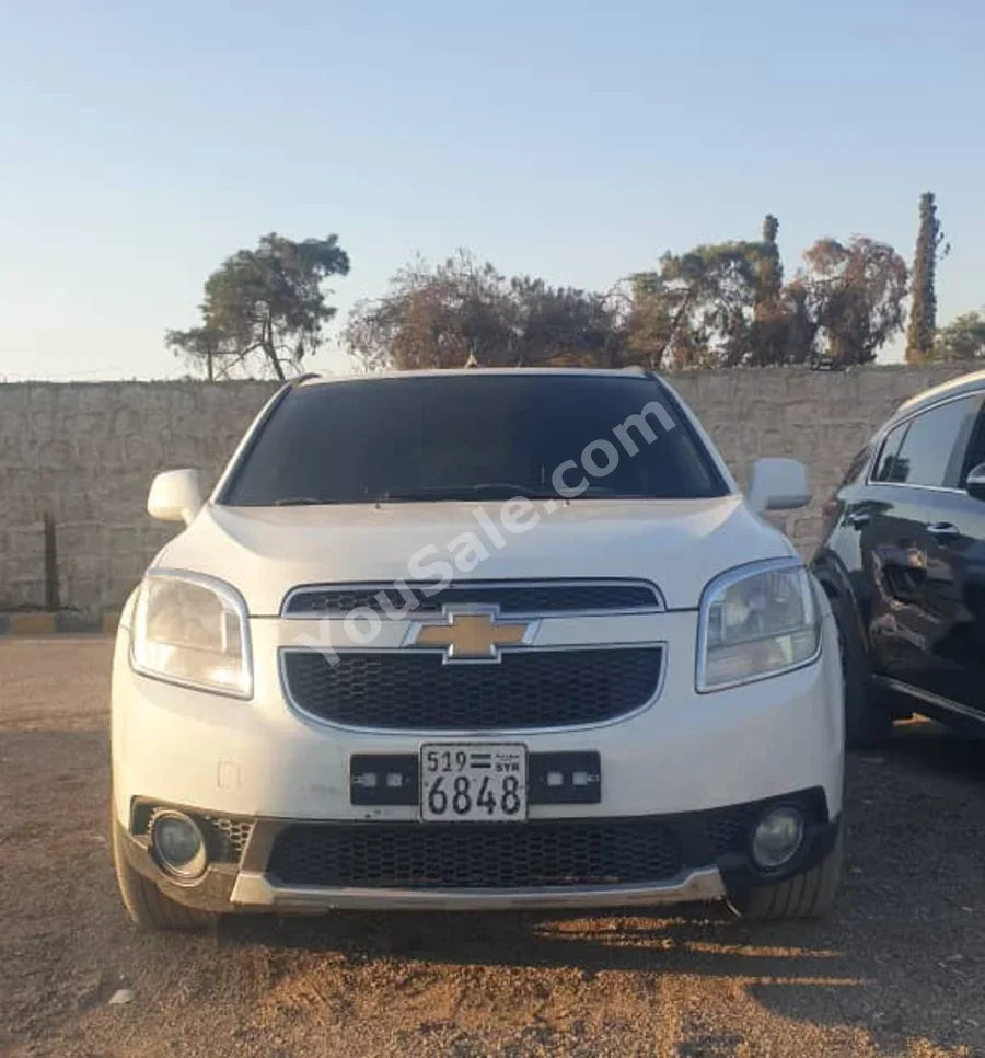Chevrolet  Orlando  LT  2012  Automatic  176,000 km  4 Cylinder  FWD  SUV  White  Diesel