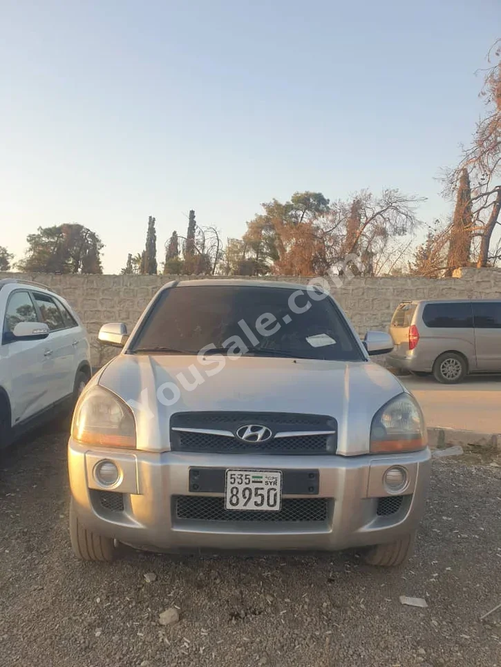 Hyundai Tucson 2009 Automatic 297,000 km 4 Cylinder FWD SUV Silver Diesel