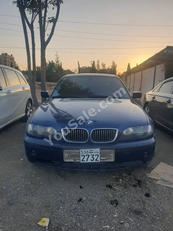 BMW  3-Series  320i  2004  Automatic  288,000 km  6 Cylinder  RWD  Sedan  Blue  Gasoline