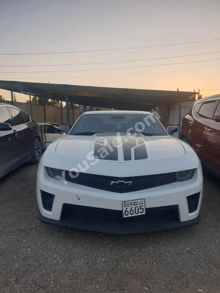 Chevrolet  Camaro  RS  2011  Automatic  189,000 km  6 Cylinder  RWD  Coupe / Sport  White  Gasoline