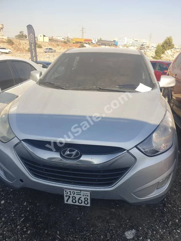 Hyundai  Tucson  2011  Automatic  270,000 km  4 Cylinder  FWD  SUV  Silver  Diesel