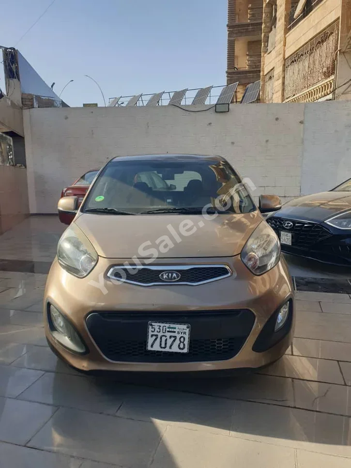 Kia  Picanto  2012  Automatic  110,000 km  4 Cylinder  FWD  Hatchback  Light Brown  Gasoline