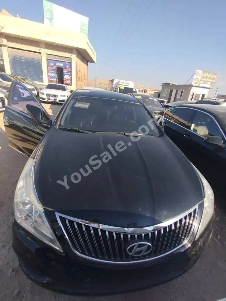 Hyundai  Grandeur  2012  Automatic  120,000 km  4 Cylinder  FWD  Sedan  Black  Gasoline