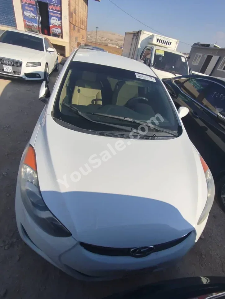 Hyundai  Elantra  2012  Automatic  100,000 km  4 Cylinder  FWD  Sedan  White  Gasoline