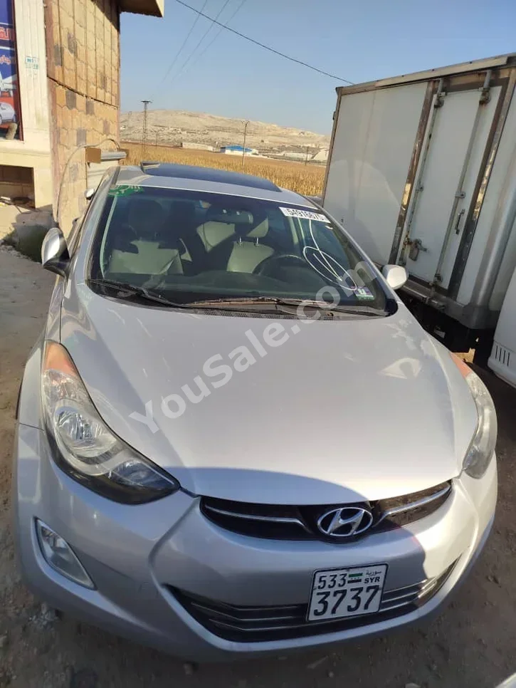 Hyundai  Elantra  2012  Automatic  90,000 km  4 Cylinder  FWD  Sedan  Silver  Gasoline