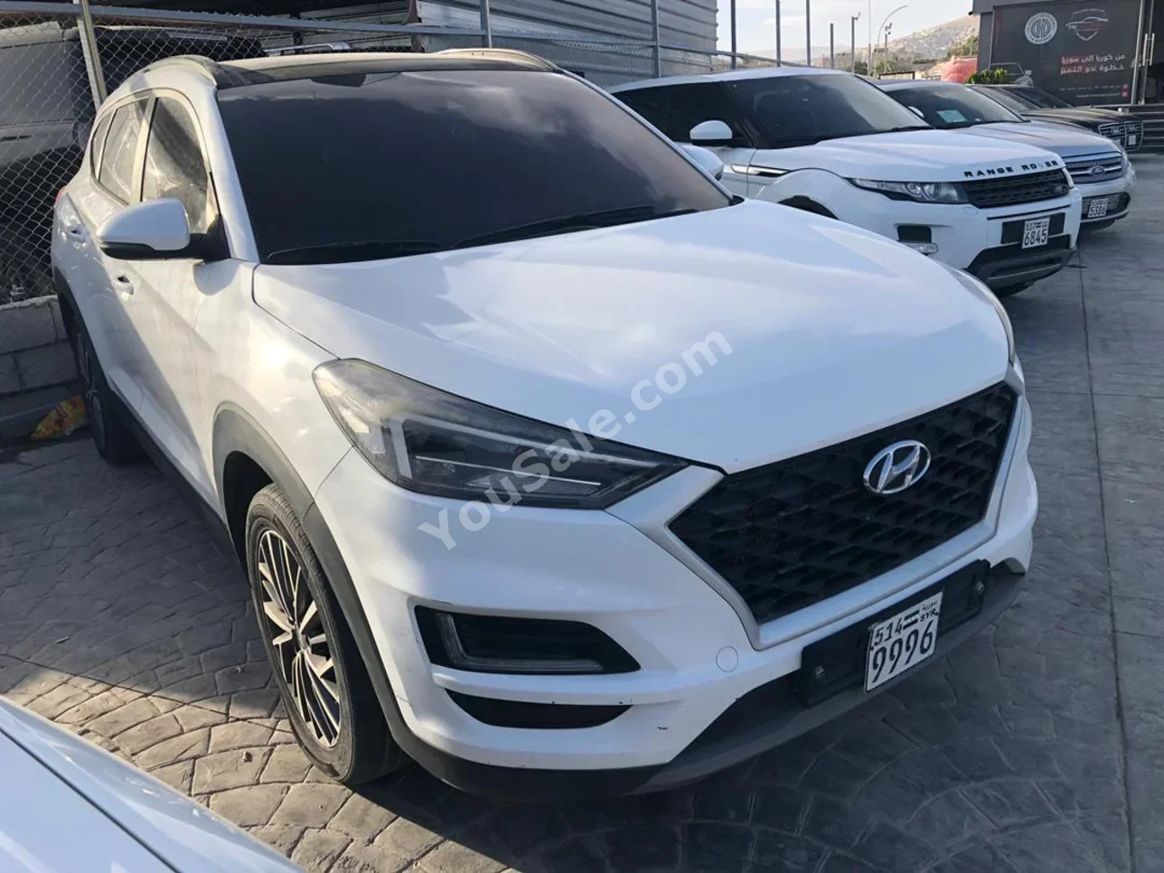 Hyundai  Tucson  2019  Automatic  227,000 km  6 Cylinder  AWD  SUV  White  Diesel