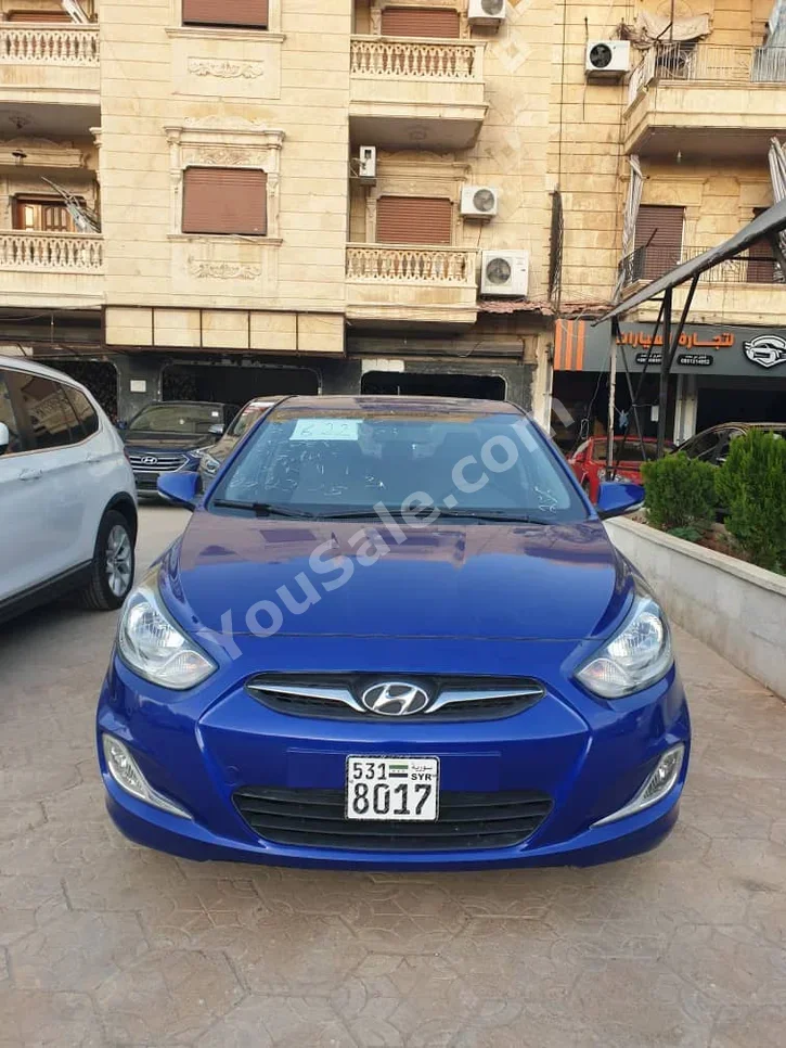 هيونداي اكسنت 2013 اتوماتيك 200,000 كم 4 سلندر دفع أمامي سيدان ازرق بنزين