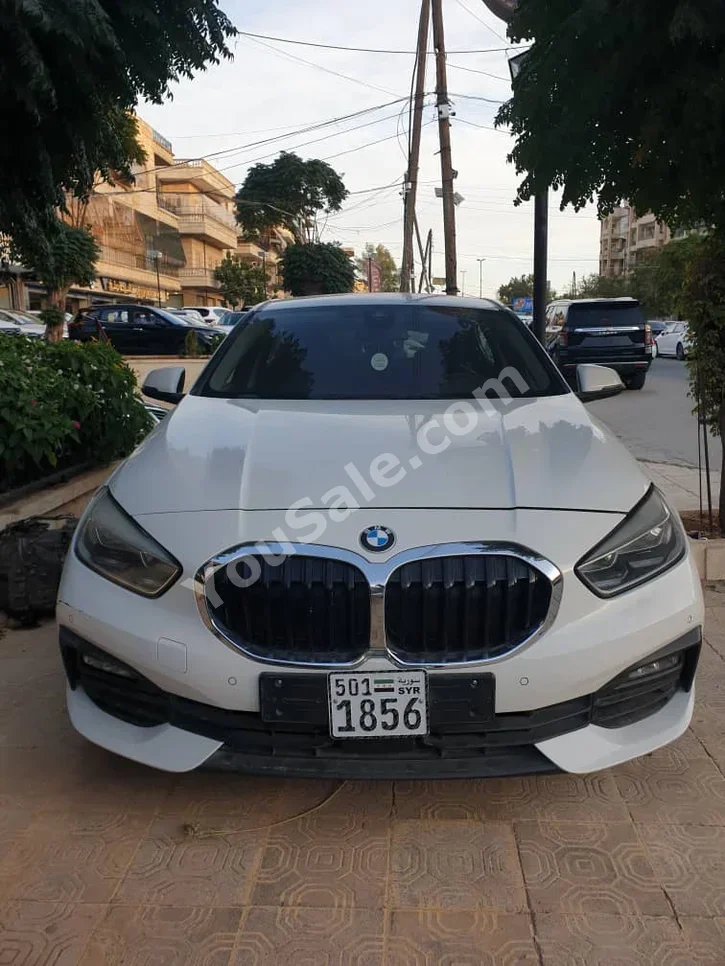 BMW 1-Series 118i 2019 Automatic 73,000 km 4 Cylinder RWD Hatchback White Gasoline