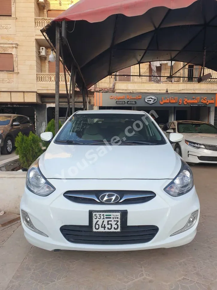 Hyundai Accent 2013 Automatic 132,000 km 4 Cylinder FWD Sedan White Gasoline
