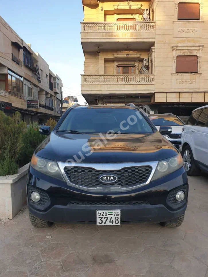Kia  Sorento  2011  Automatic  159,000 km  4 Cylinder  FWD  SUV  Black  Gasoline