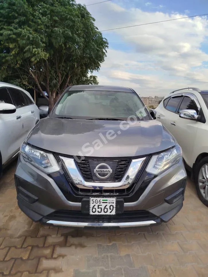 Nissan  Rogue  2017  Automatic  120,000 km  4 Cylinder  4WD  SUV  Dark Gray  Gasoline