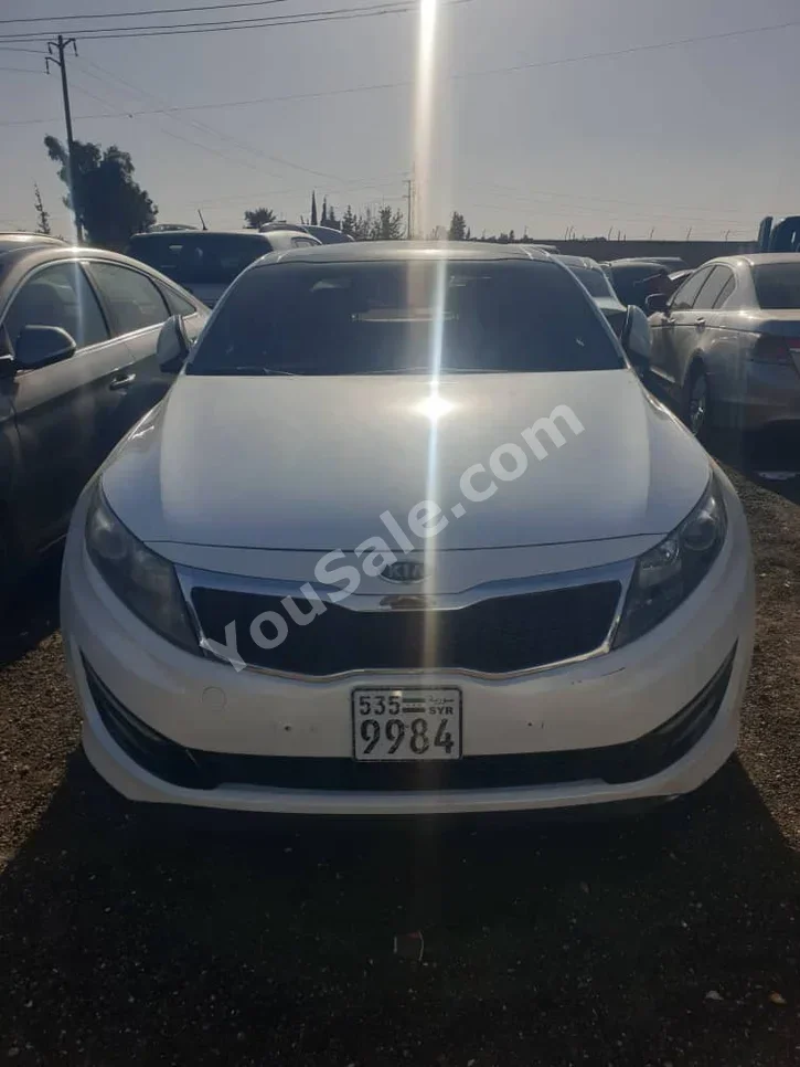 Kia  K5  2012  Automatic  99,000 km  4 Cylinder  FWD  Sedan  White  Gasoline