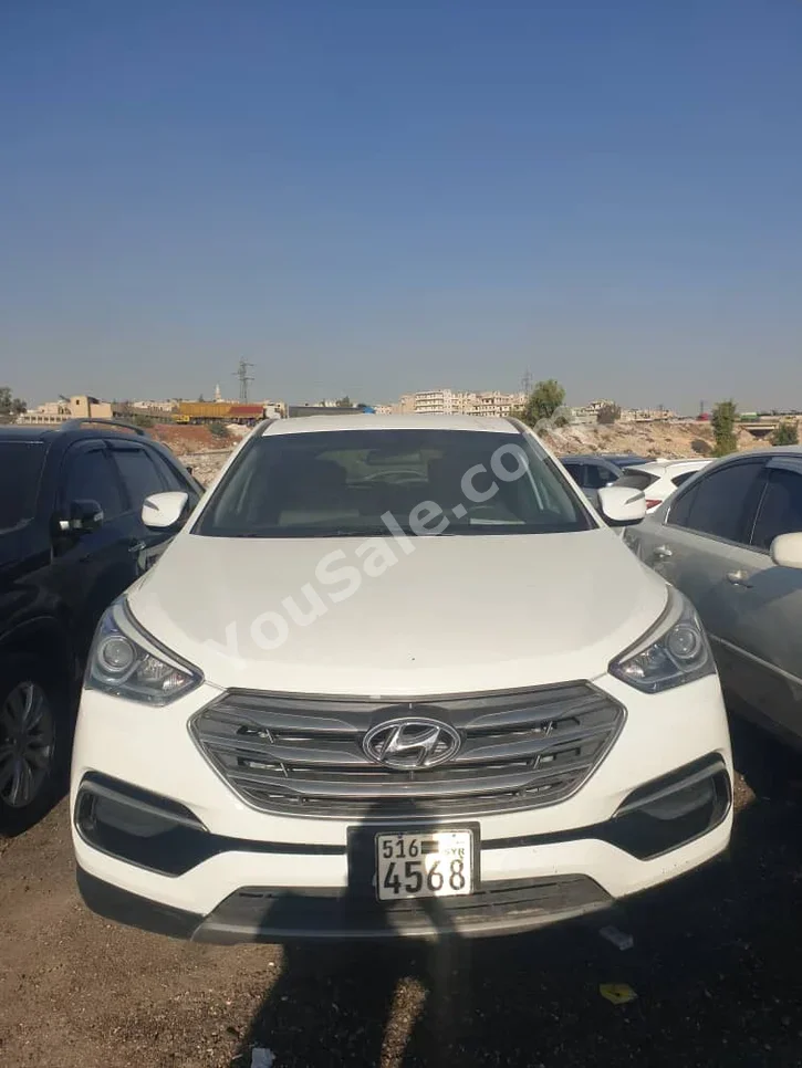 Hyundai  Santa Fe  2017  Automatic  154,000 km  4 Cylinder  4WD  SUV  White  Gasoline