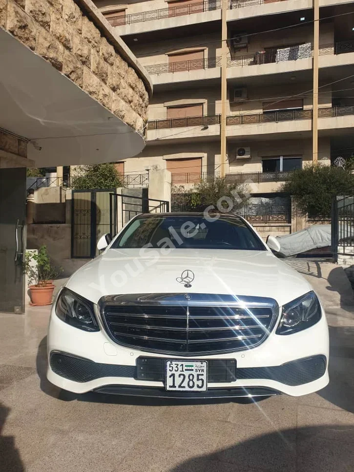 Mercedes-Benz  E-Class  300  2017  Automatic  117,000 km  6 Cylinder  RWD  Sedan  White  Gasoline