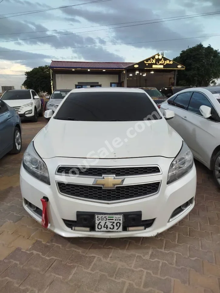 Chevrolet  Malibu  LT  2015  Automatic  170,000 km  4 Cylinder  FWD  Sedan  White  Diesel